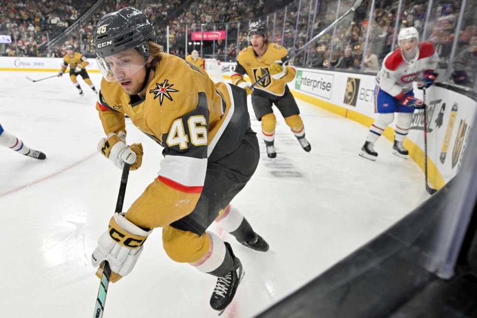 Vegas Golden Knights right wing Jonas Rondbjerg (46) handles the puck along the boards against ...