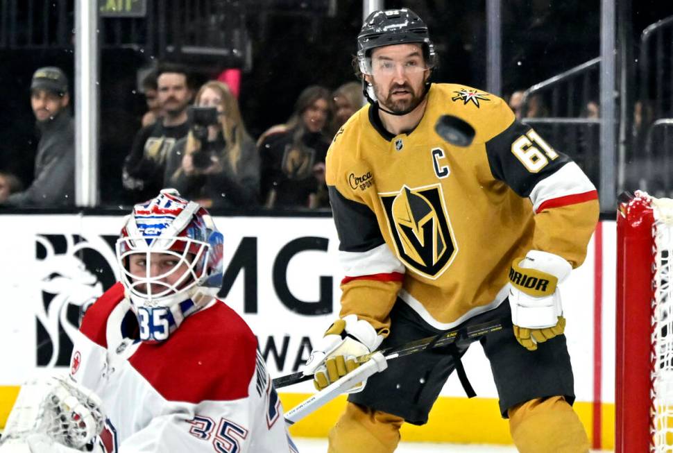 Vegas Golden Knights right wing Mark Stone (61) watches the puck fly by the goal as Montreal Ca ...