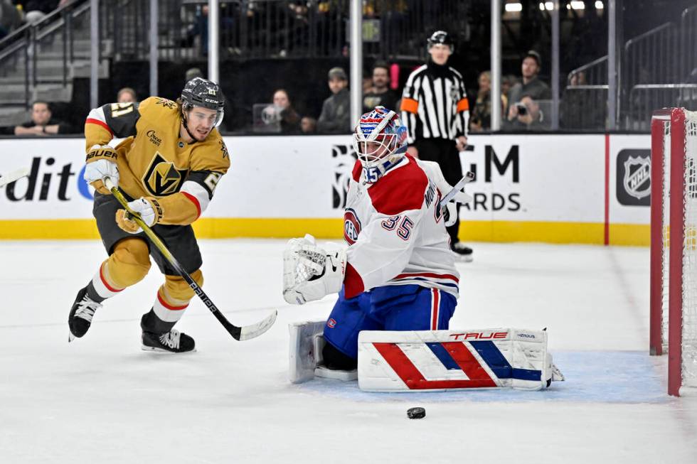 Vegas Golden Knights goaltender Adin Hill stops the puck during the third period of an NHL hock ...