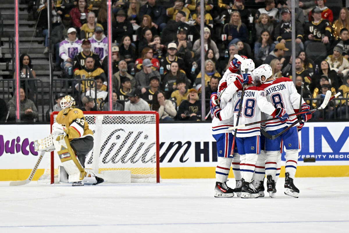 Montreal Canadiens players celebrate after a goal by right wing Cole Caufield during the second ...