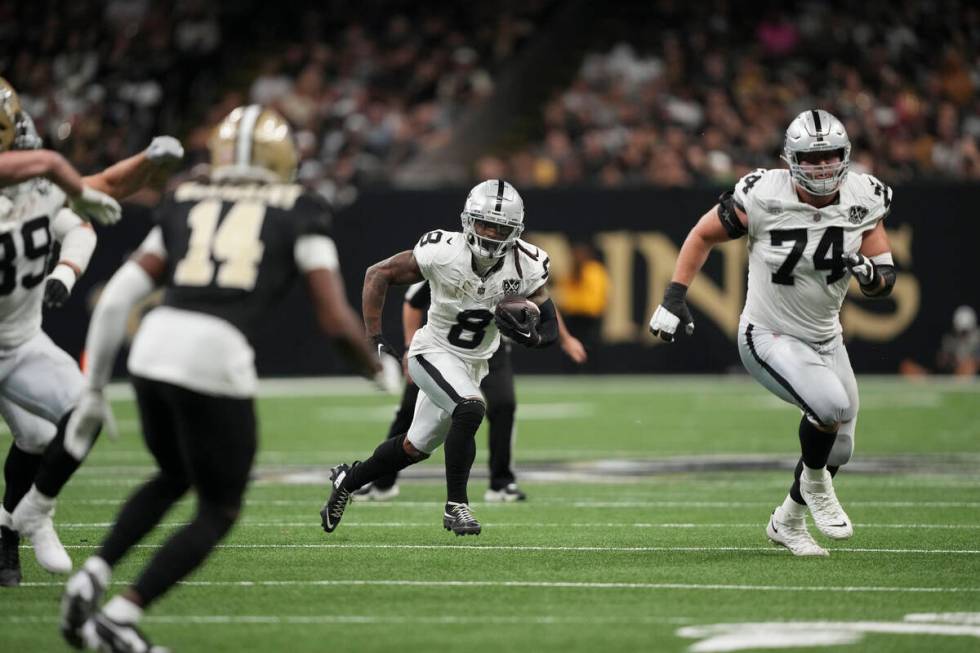 Las Vegas Raiders running back Ameer Abdullah (8) carries in the first half of an NFL football ...