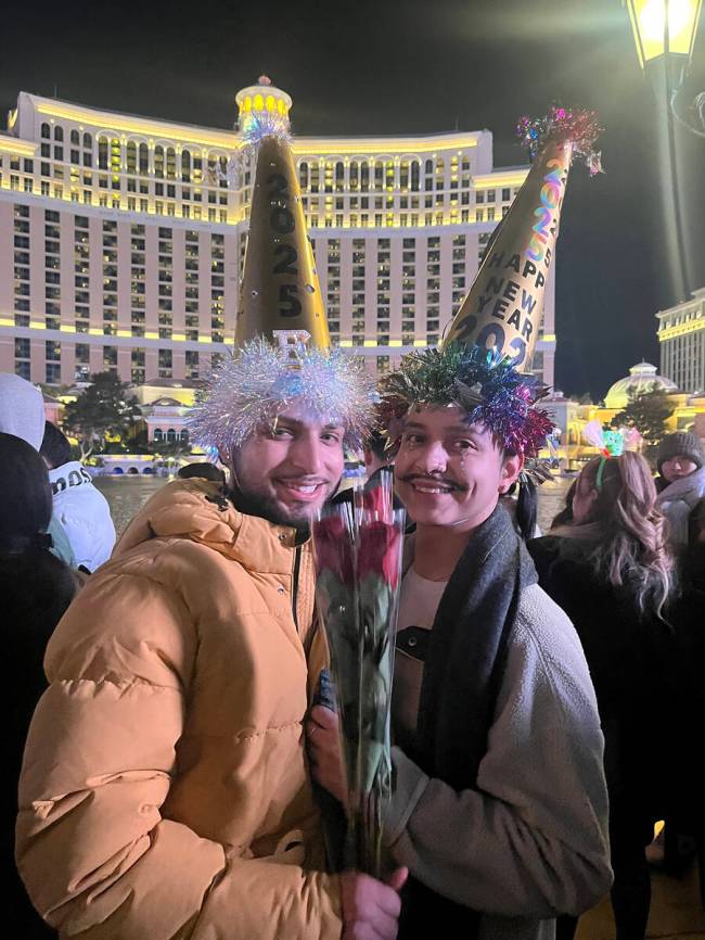 Brandon Garza and Ethan Molina enjoy the Bellagio fountain show on December 31, 2024. (Katelyn ...