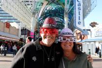 Daniel Escarciga of Southern California and Terese Fogwell of Bullhead City, Ariz. talk to a re ...