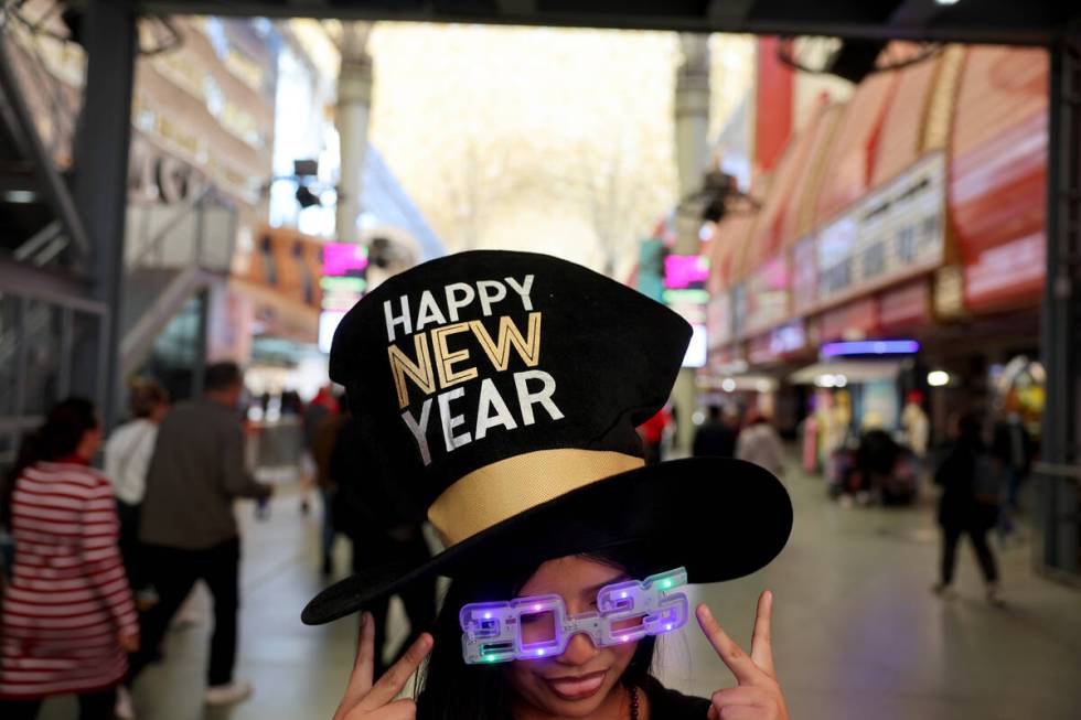 Dania Morales talks to a reporter at the Fremont Street Experience in downtown Las Vegas on New ...