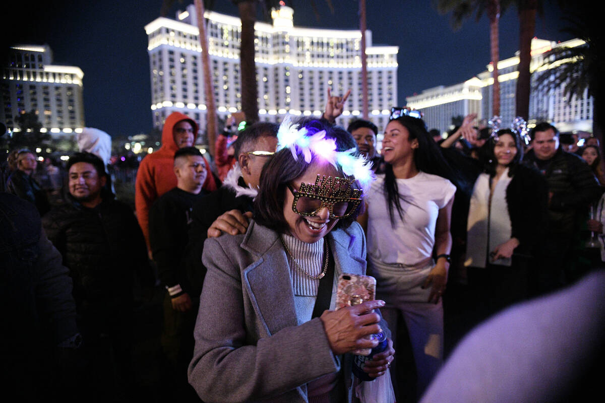 Revelers celebrate New Year’s Eve on the Strip Tuesday, December 31, 2024, in Las Vegas. ...