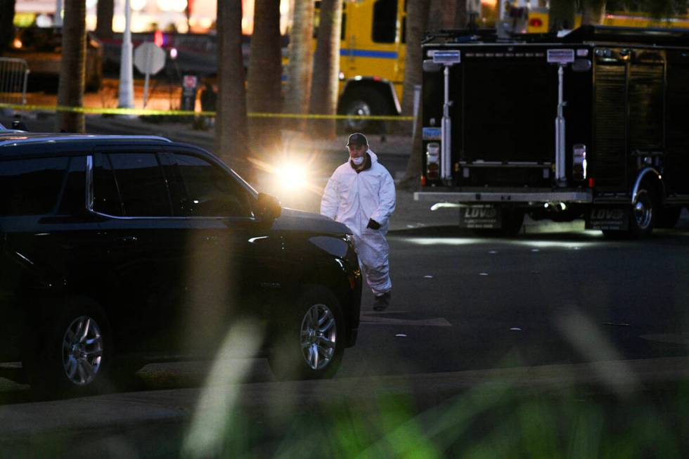 A worker in a hazmat suit is seen after a Tesla Cybertruck exploded outside Trump International ...