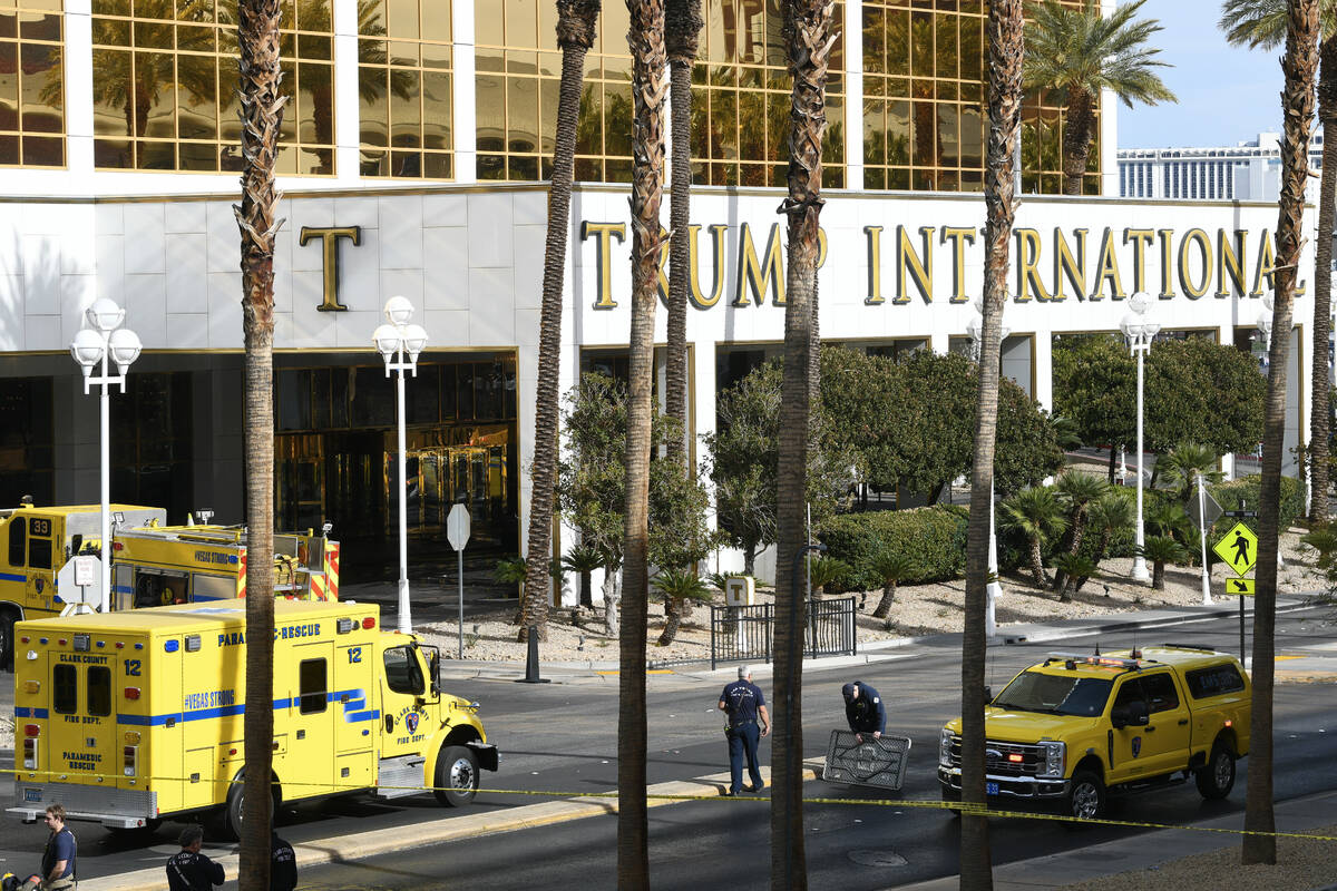 Clark County Fire Department crews are seen staging outside Trump International Hotel in Las Ve ...