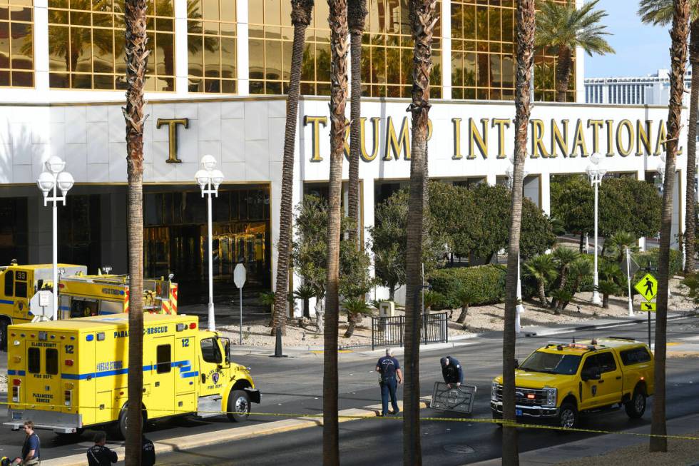 Clark County Fire Department crews are seen staging outside Trump International Hotel in Las Ve ...