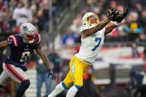 Los Angeles Chargers cornerback Kristian Fulton (7) dives for a pass during the second half of ...