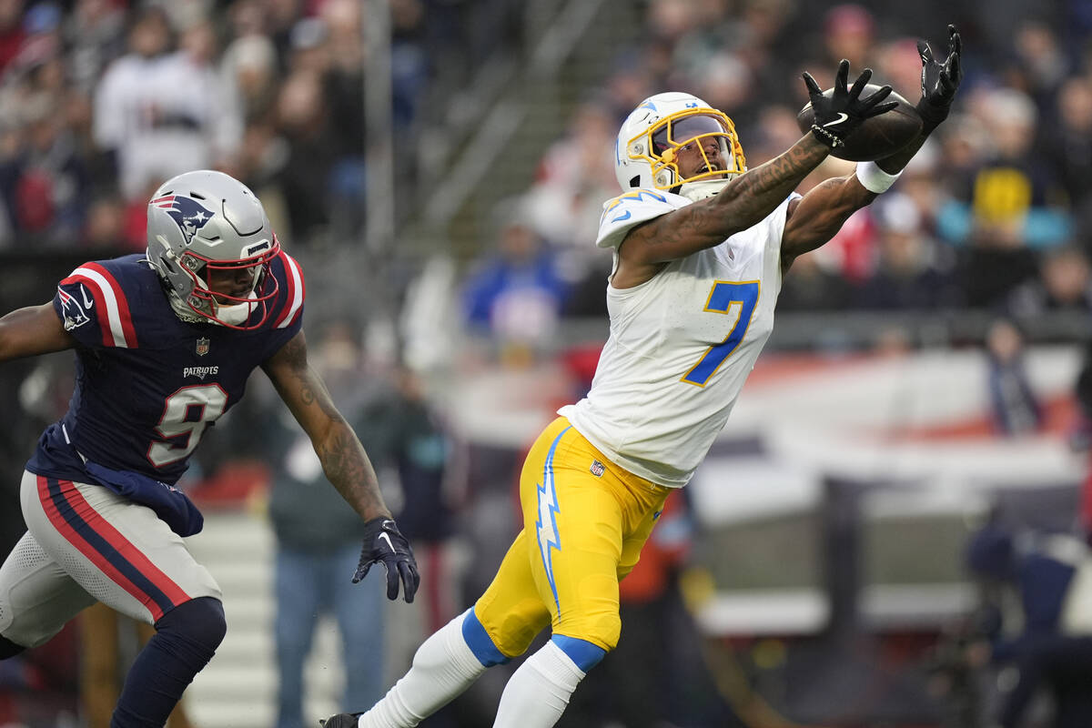 Los Angeles Chargers cornerback Kristian Fulton (7) dives for a pass during the second half of ...