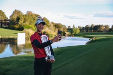 Nelly Korda films a video for her fans during the T-Mobile Match Play championship match at Sha ...