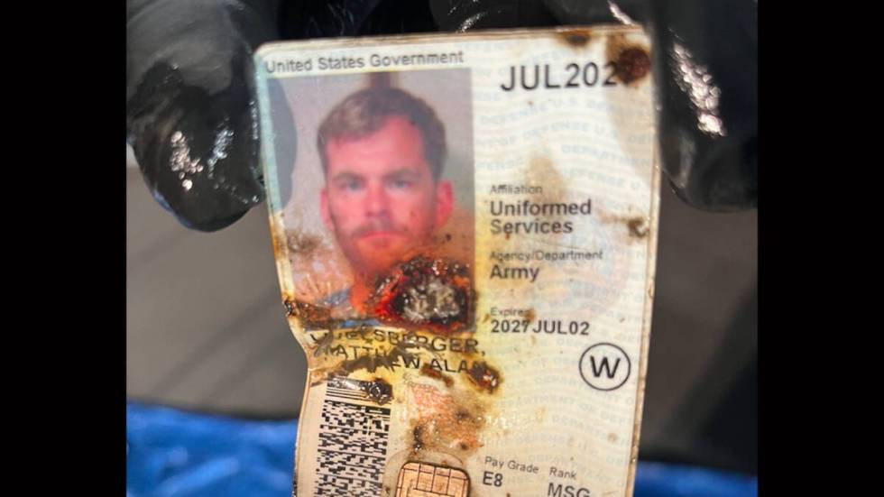 A photo of the military ID belonging to Matthew Alan Livelsberger is shown during a news confer ...