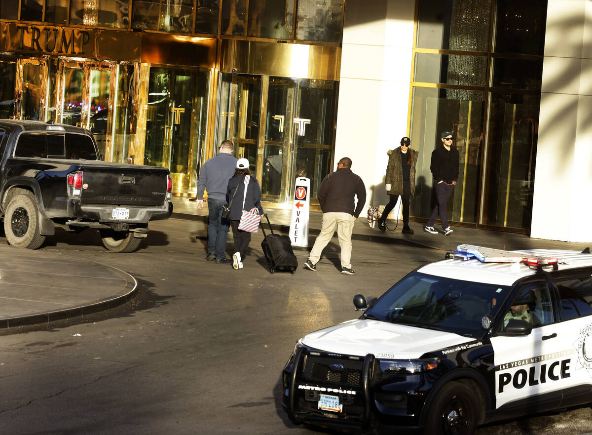 Guests are seen at the valet area outside Trump International Hotel in Las Vegas Thursday, Jan. ...