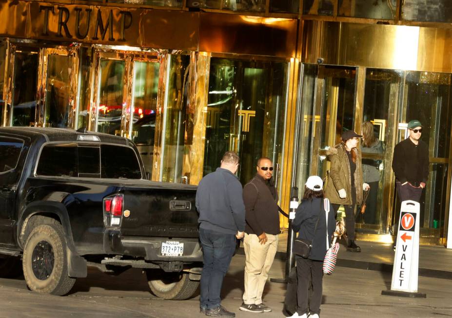 Guests are seen at the valet area outside Trump International Hotel in Las Vegas Thursday, Jan. ...