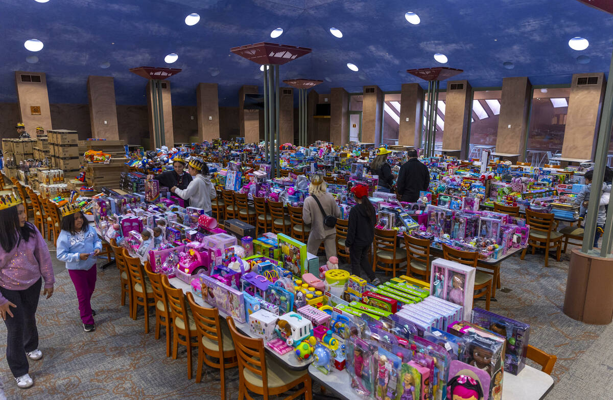 Kids wander amongst numerous gift to search for their favorite inside as Clark County celebrate ...