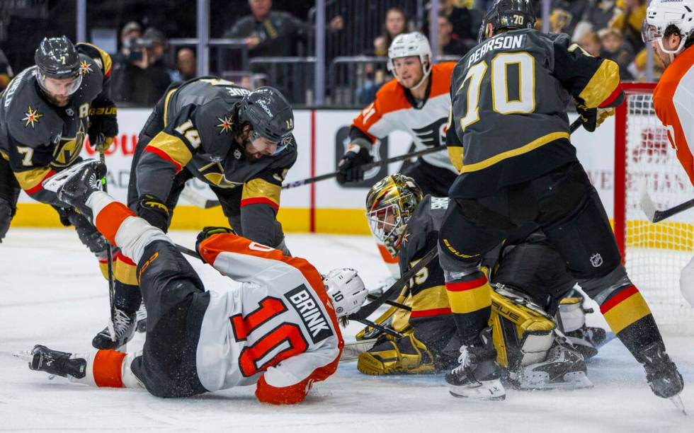 Golden Knights goaltender Ilya Samsonov (35) smothers a shot by Philadelphia Flyers right wing ...