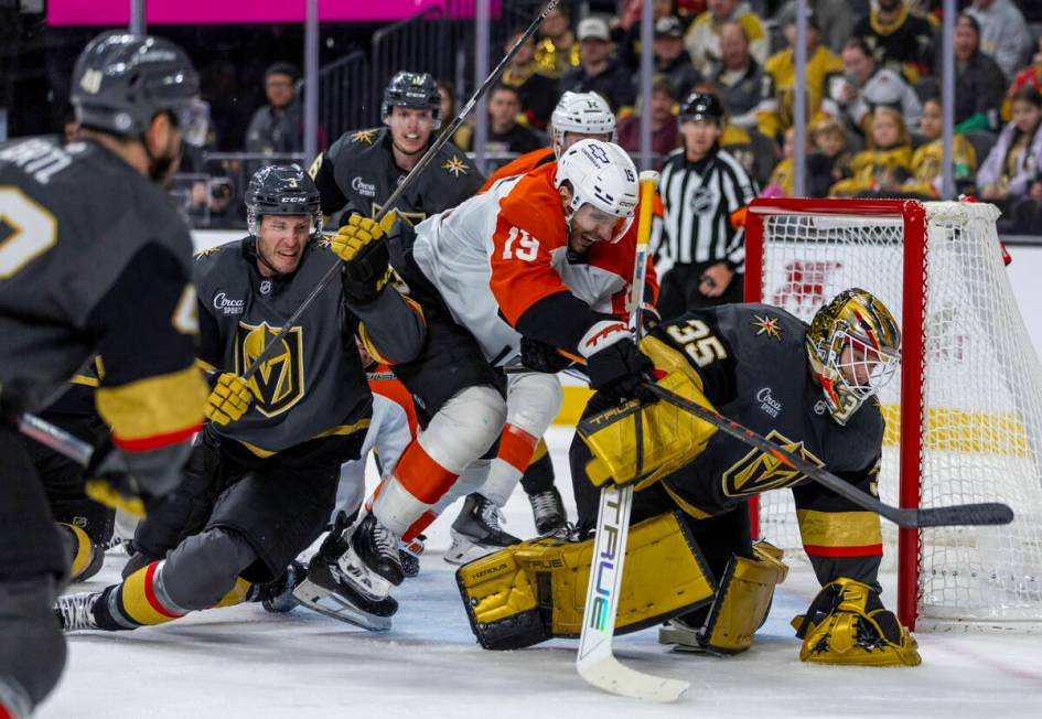 Golden Knights goaltender Ilya Samsonov (35) smothers a shot by Philadelphia Flyers right wing ...