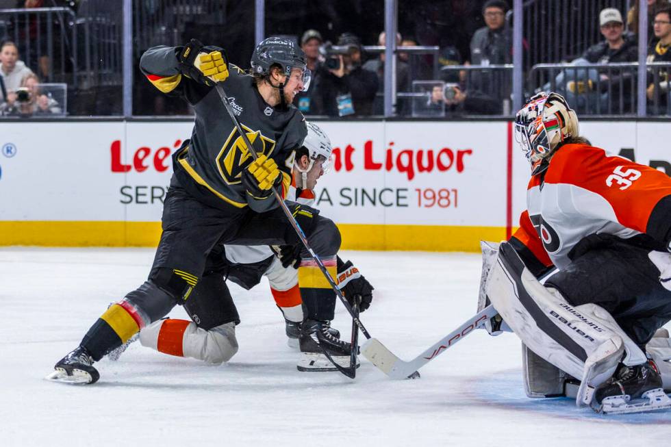 Golden Knights Wing Jonas Rondbjerg (46) looks to score against the Philadelphia Flyers goalten ...