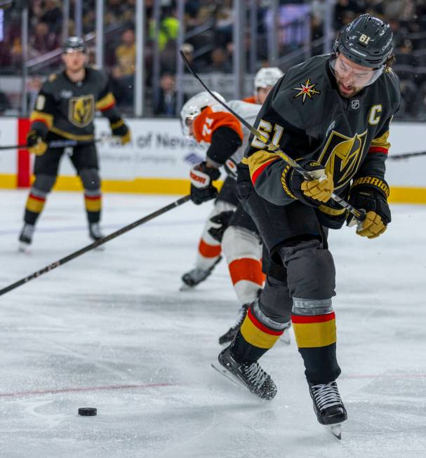 Golden Knights right wing Mark Stone (61) looks back to a puck as he gets past Philadelphia Fly ...