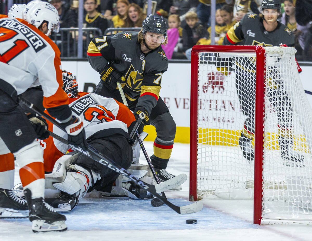 Golden Knights center William Karlsson (71) looks to a deflected shot near the net behind d Phi ...