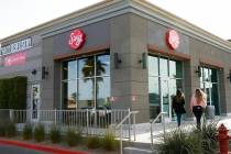 Employees enter Swig, a Utah-based soda chain, at 1160 E Silverado Ranch Blvd, on Wednesday, Ja ...