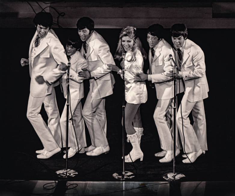 The Osmond Brothers, with new member Donny (second from left) and Wayne (third from left) perfo ...