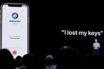 Craig Federighi, Apple's senior vice president of Software Engineering, speaks about Siri durin ...