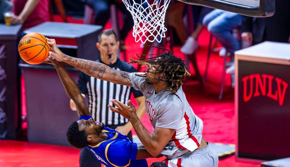 San Jose State Spartans guard Josh Uduje (9) has a shot rejected by UNLV forward Jeremiah &quot ...