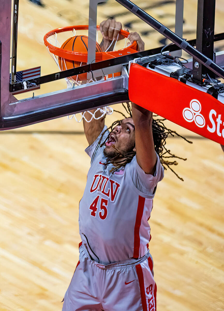 UNLV forward Jeremiah "Bear" Cherry (45) dunks the ball against the San Jose State Sp ...