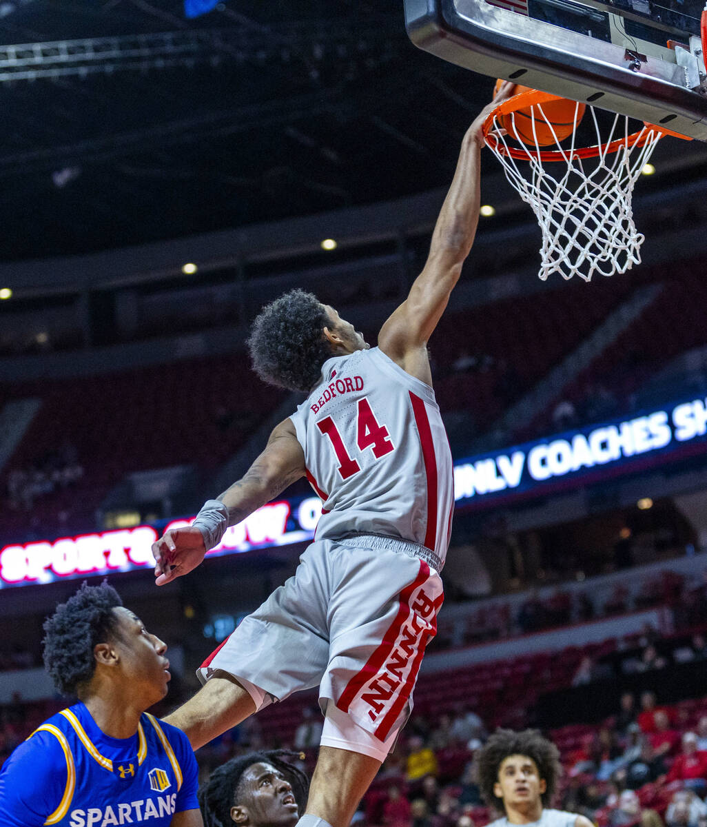 UNLV guard Jailen Bedford (14) catches some air on the way to the hoop past San Jose State Spar ...