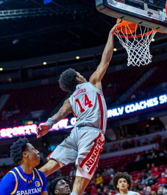 UNLV guard Jailen Bedford (14) catches some air on the way to the hoop past San Jose State Spar ...