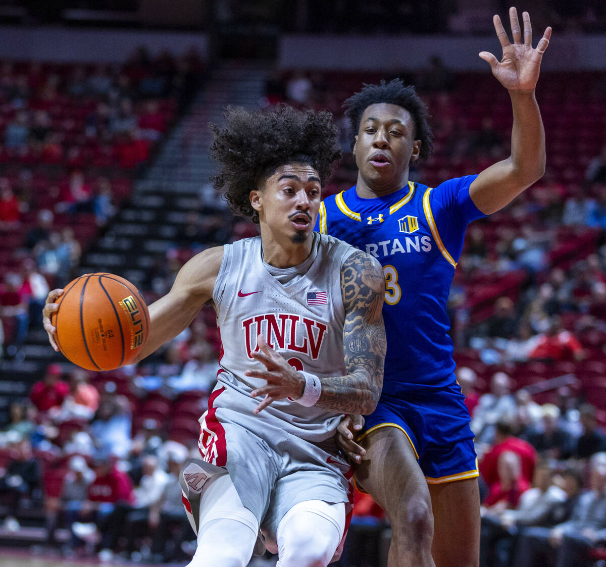 UNLV guard Brooklyn Hicks (13) gets inside on the lane against San Jose State Spartans guard Je ...