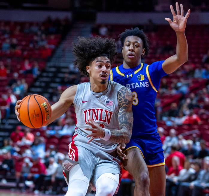 UNLV guard Brooklyn Hicks (13) gets inside on the lane against San Jose State Spartans guard Je ...