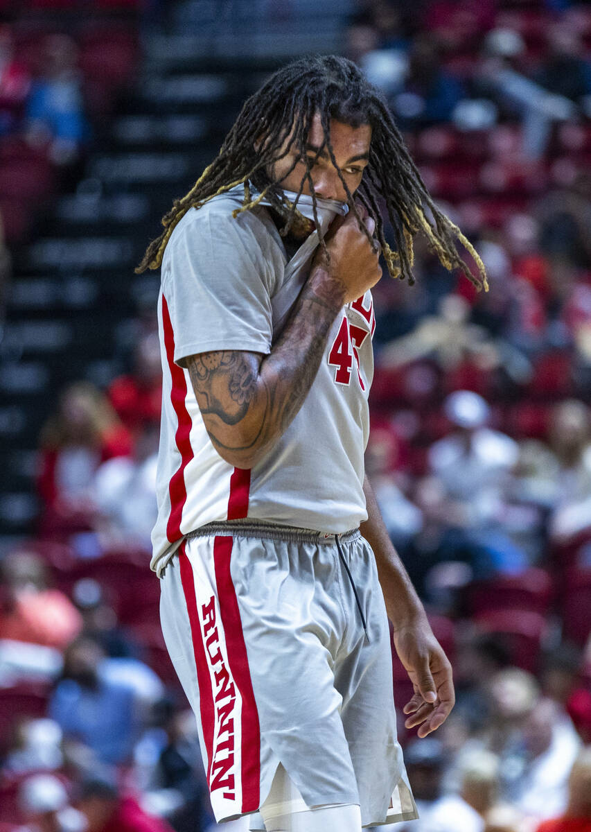 UNLV forward Jeremiah "Bear" Cherry (45) is unhappy after another goaltending call ag ...