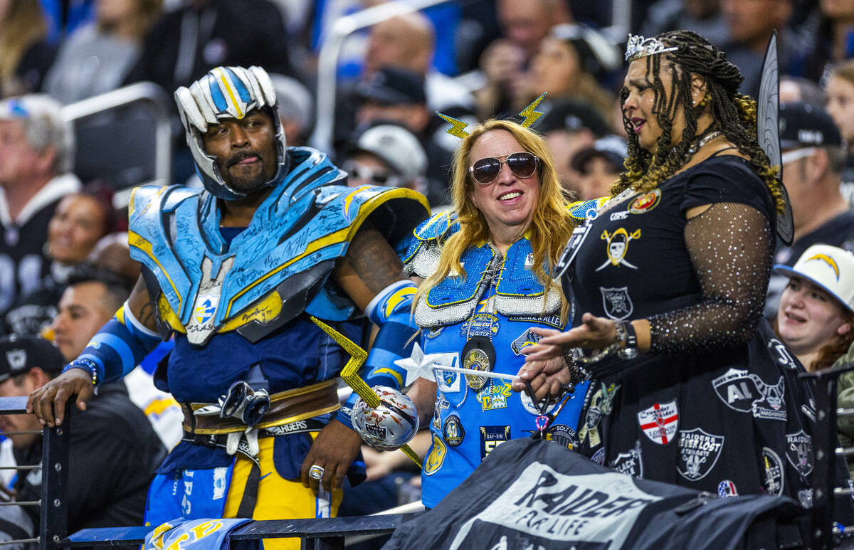 Raiders fan Danielle "TinkerHell" Dillard converts with Los Angeles Chargers fans dur ...