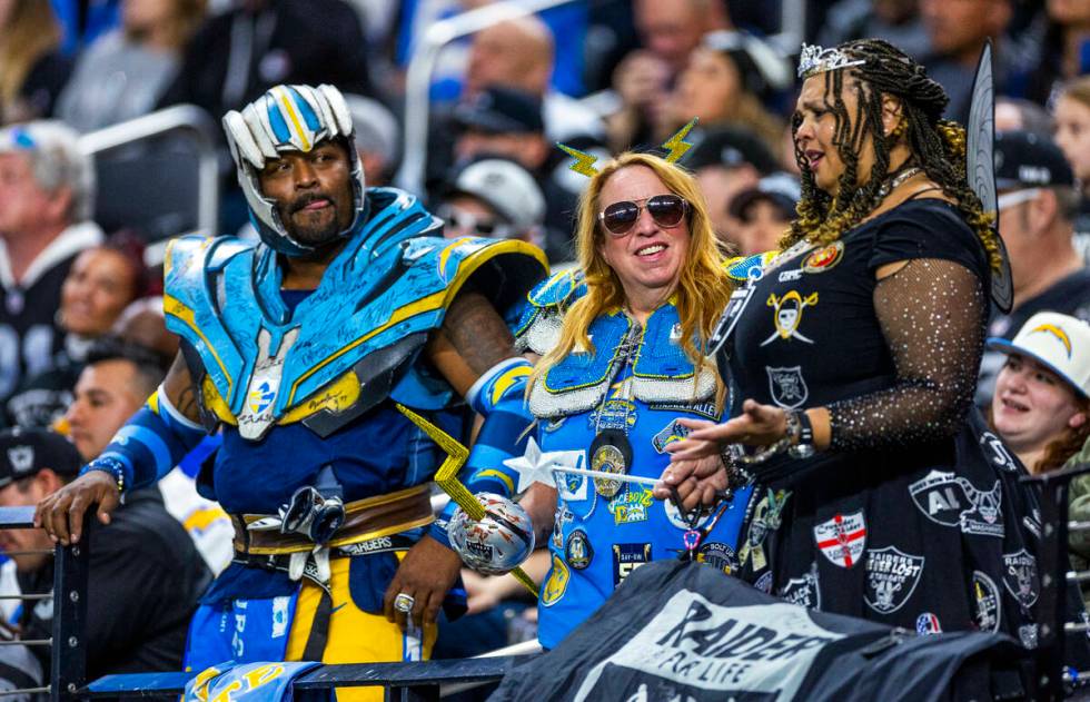 Raiders fan Danielle "TinkerHell" Dillard converts with Los Angeles Chargers fans dur ...