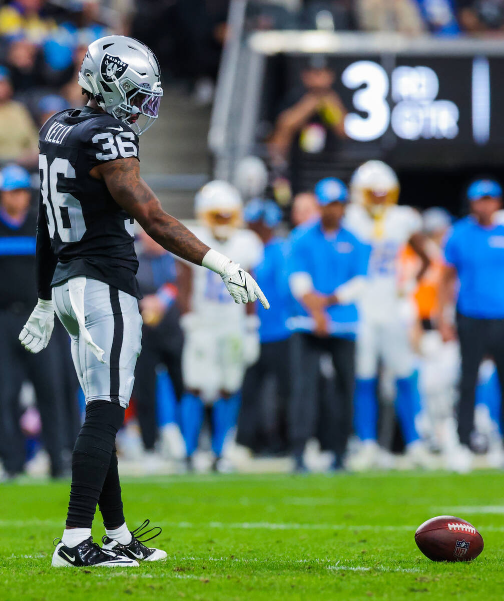 Raiders cornerback Kyu Blu Kelly (36) points to a dead ball during an NFL football game between ...