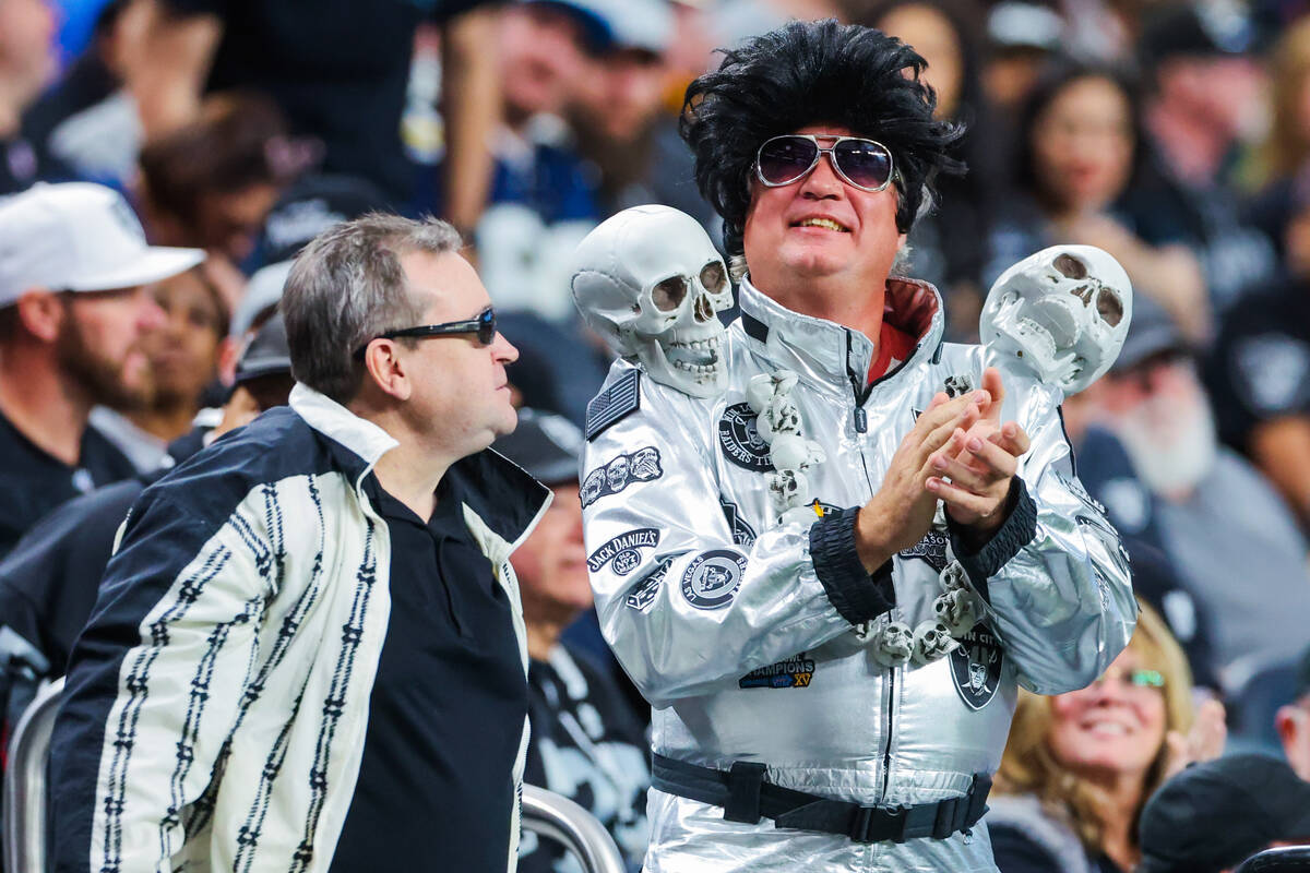 A Raiders fan dressed as Elvis is seen during an NFL football game between the Raiders and Los ...