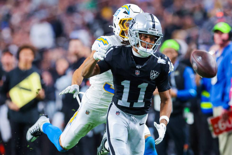 Raiders wide receiver Tre Tucker (11) misses the ball near the end zone during an NFL football ...