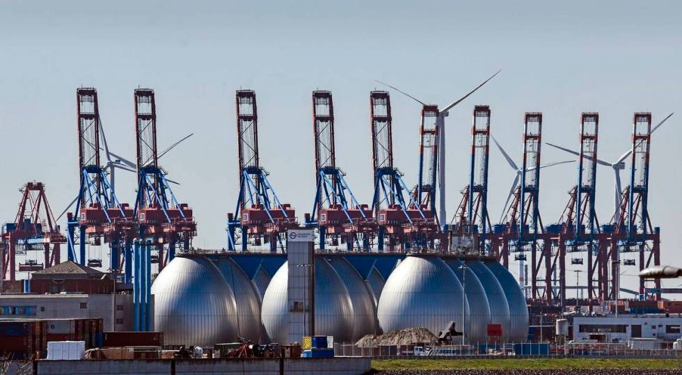 Tanks for producing bio gas are pictured at the harbor in Hamburg, Germany. (AP Photo/Martin Me ...