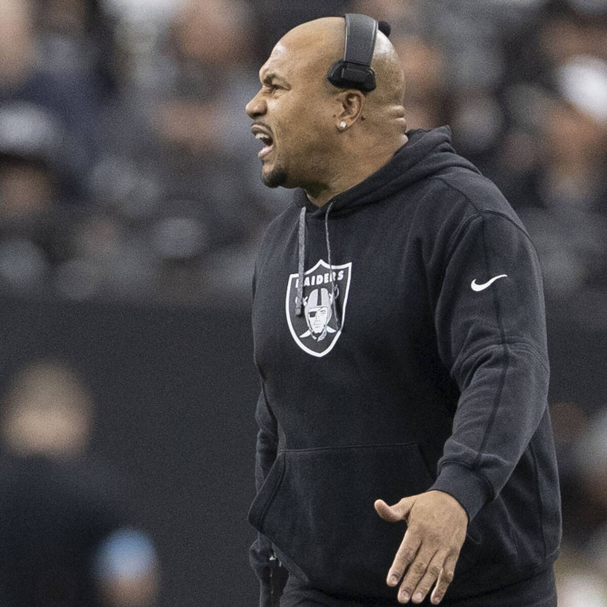 Raiders head coach Antonio Pierce reacts from the sideline during the first half of an NFL game ...