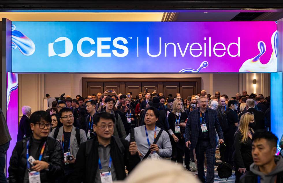 Attendees arrive to CES Unveiled on the first media day of the annual international consumer el ...