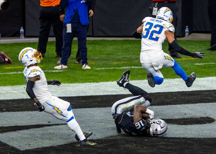 Raiders wide receiver Jakobi Meyers (16) secures a touchdown pass Los Angeles Chargers safety A ...