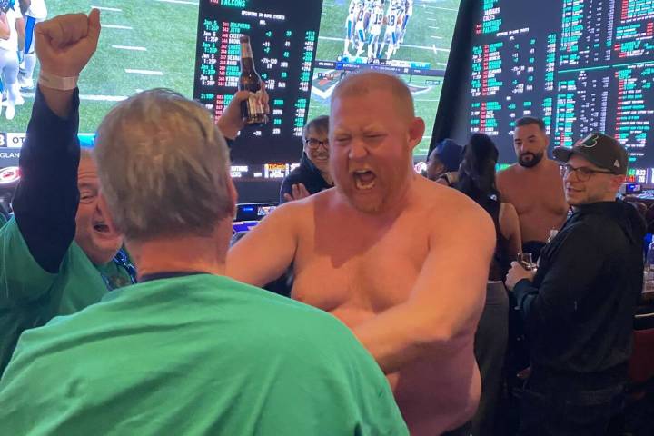 Carson Williams, center, celebrates with the rest of team Meatball Brothers after winning a pie ...