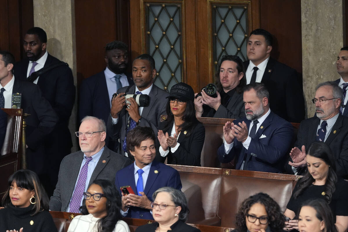 The joint session of Congress convenes to confirm the Electoral College votes, affirming Presid ...