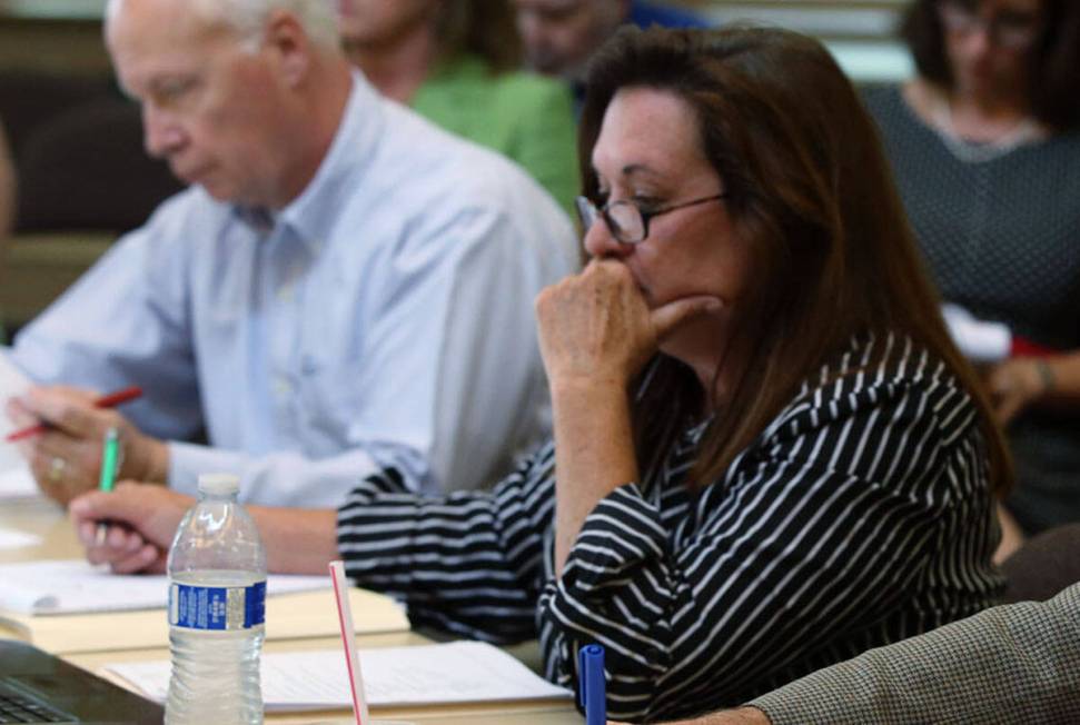 FILE - Neena Laxalt working during a Nevada Sesquicentennial Commission meeting in Carson City ...