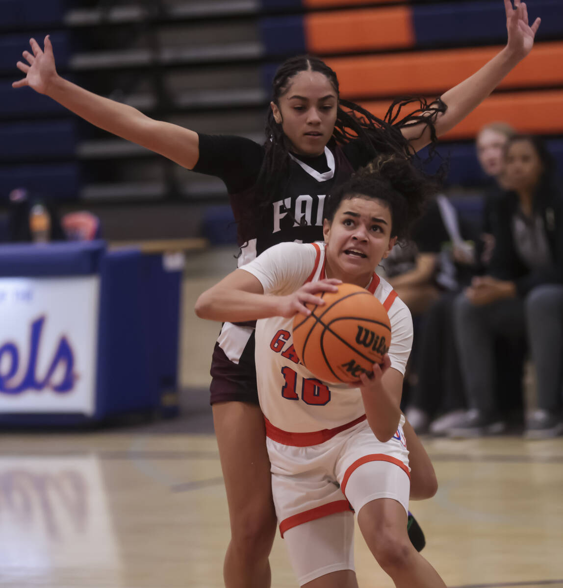 Bishop Gorman's Aaliah Spaight (10) drives to the basket past Faith Lutheran during a high scho ...