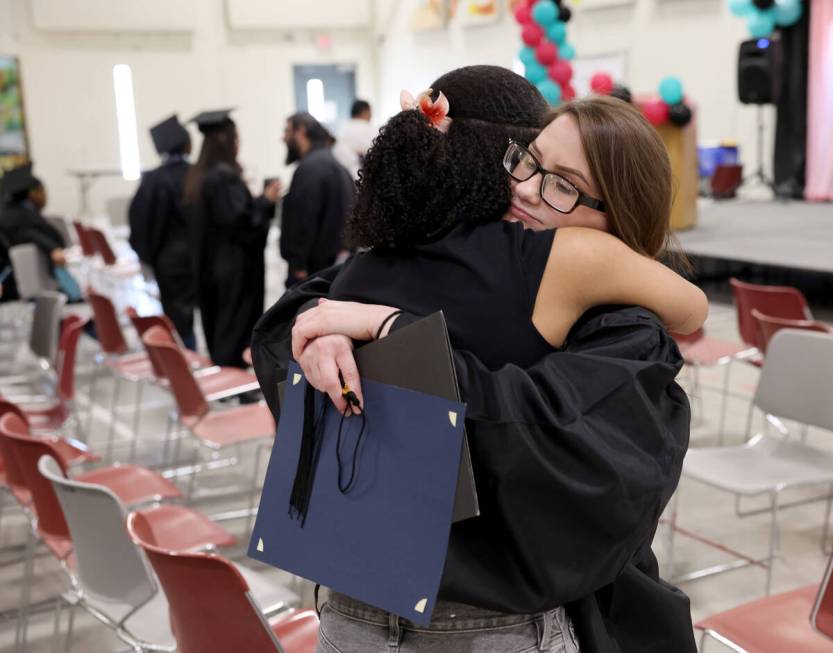 Melanie Costantini, an inmates at Florence McClure Women’s Correctional Center, hugs her ...