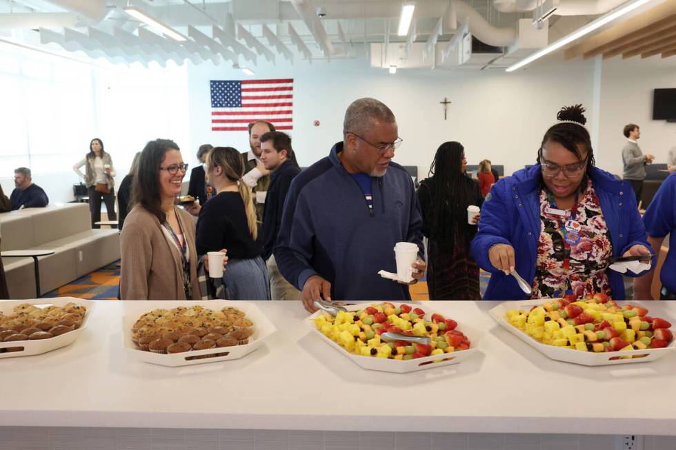 Guests mingle during the opening ceremony for the new Gaughan Family Student Union at Bishop Go ...