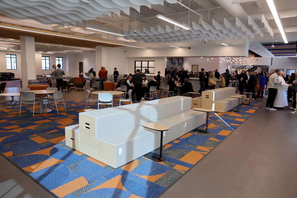 Guests mingle during the opening ceremony for the new Gaughan Family Student Union at Bishop Go ...